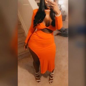 Dress worn once , very gorgeous orange dress in medium